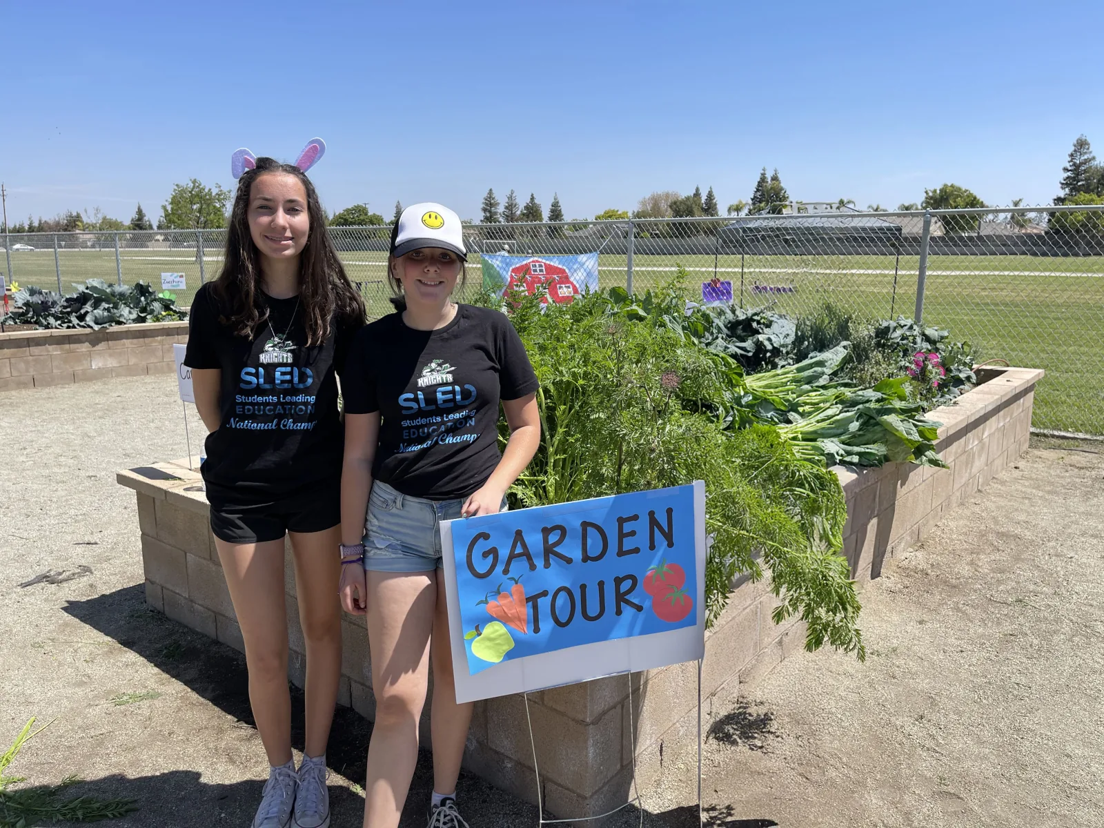 Students at a school garden project they lead